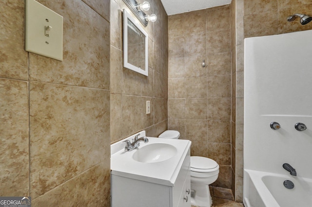 107 Overland Trl, Savannah, GA 31419 - full bath featuring vanity, tile walls, and bathtub / shower combination