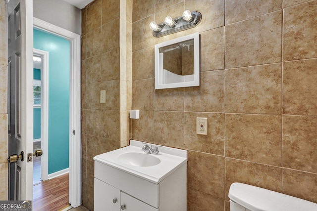 107 Overland Trl, Savannah, GA 31419 - bathroom with vanity, tile walls, and wood finished floors