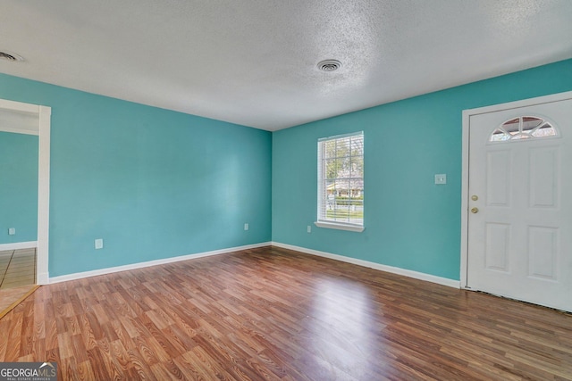 107 Overland Trl, Savannah, GA 31419 - entryway with a textured ceiling and wood finished floors