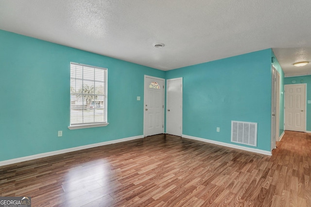 107 Overland Trl, Savannah, GA 31419 - foyer entrance with a textured ceiling and wood finished floors