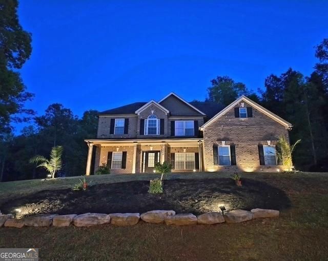 224 Jester Ct, Mcdonough, GA 30252 - view of front of home featuring brick siding and a porch