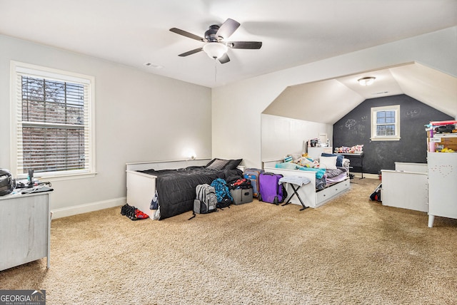 224 Jester Ct, Mcdonough, GA 30252 - bedroom featuring a ceiling fan, visible vents, vaulted ceiling, baseboards, and carpet