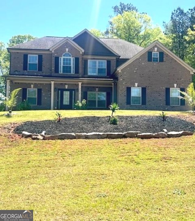 224 Jester Ct, Mcdonough, GA 30252 - view of front of home with brick siding and a front lawn