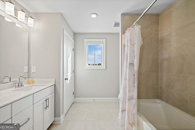 bathroom featuring shower / bath combo, visible vents, vanity, and baseboards