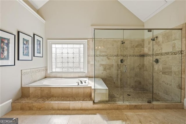 bathroom with lofted ceiling and plus walk in shower