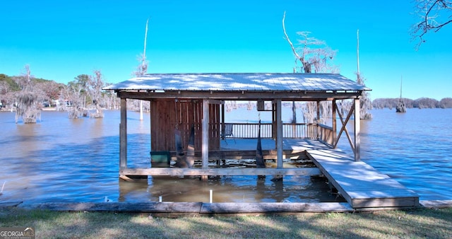 dock area featuring a water view