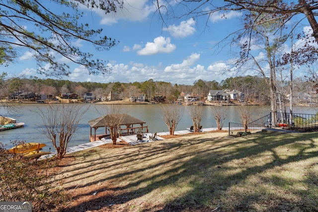 view of yard with a water view and a gazebo