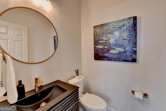 bathroom featuring a sink and toilet
