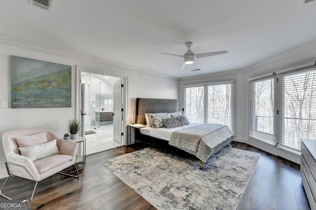 bedroom featuring visible vents, ornamental molding, and dark wood finished floors