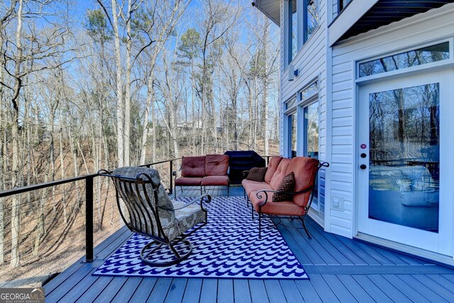 deck featuring an outdoor living space