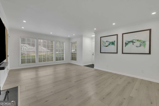 unfurnished living room featuring light hardwood / wood-style flooring