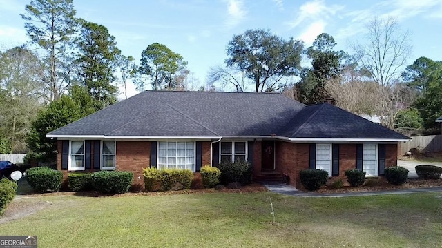 ranch-style house with a front yard