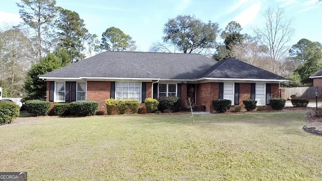 single story home with a front yard