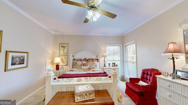 carpeted bedroom with ornamental molding and ceiling fan