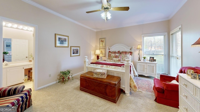 carpeted bedroom with ceiling fan, ensuite bath, and ornamental molding