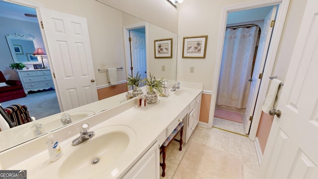 bathroom with vanity and a shower with curtain