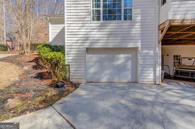 garage with driveway