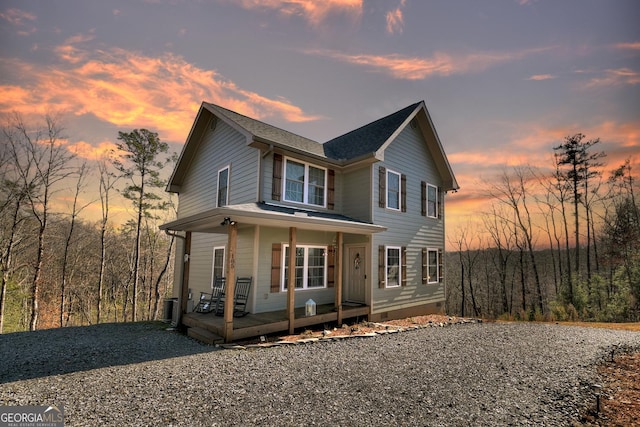 front of property featuring covered porch