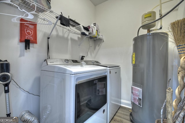 185 Sundown Trl, Ellijay, GA 30540 - laundry area featuring water heater, independent washer and dryer, and wood finished floors