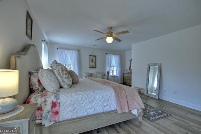 185 Sundown Trl, Ellijay, GA 30540 - bedroom with wood finished floors and ceiling fan