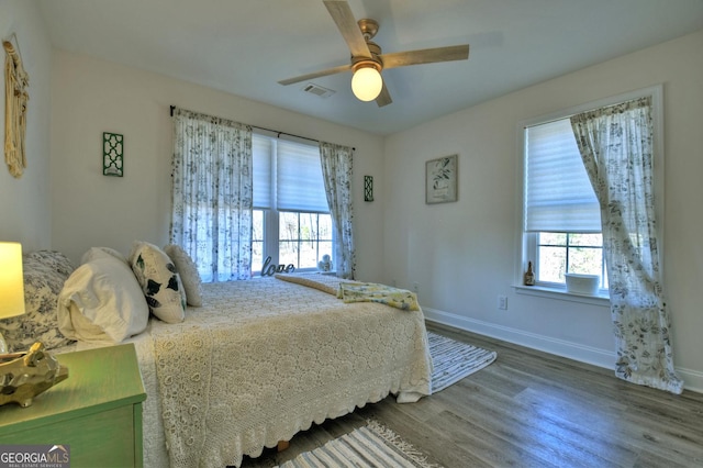 185 Sundown Trl, Ellijay, GA 30540 - bedroom with wood finished floors and a ceiling fan