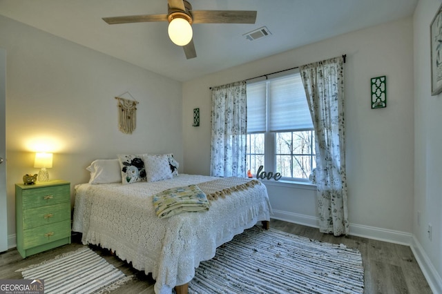 185 Sundown Trl, Ellijay, GA 30540 - bedroom with wood finished floors and a ceiling fan