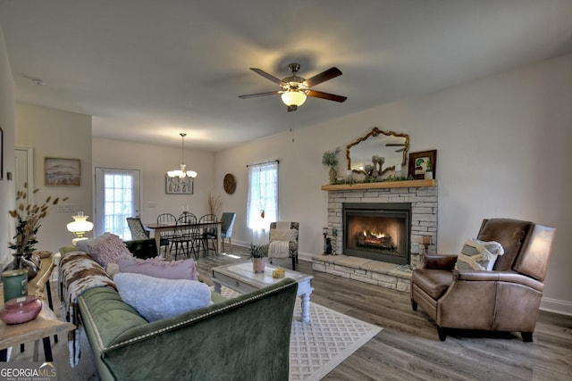 185 Sundown Trl, Ellijay, GA 30540 - living area with healthy amount of natural light, a chandelier, and wood finished floors