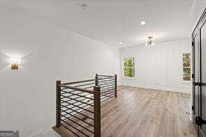 empty room featuring wood-type flooring