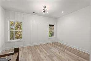 empty room featuring light hardwood / wood-style floors