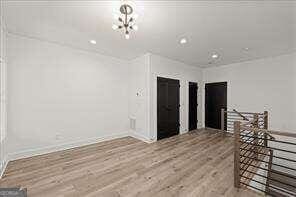 unfurnished room featuring hardwood / wood-style floors