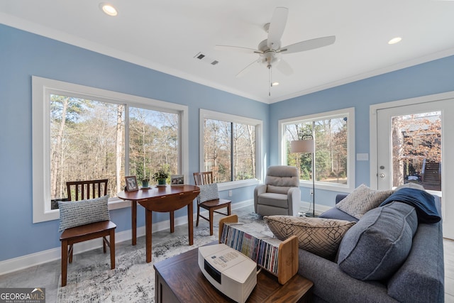 sunroom with ceiling fan