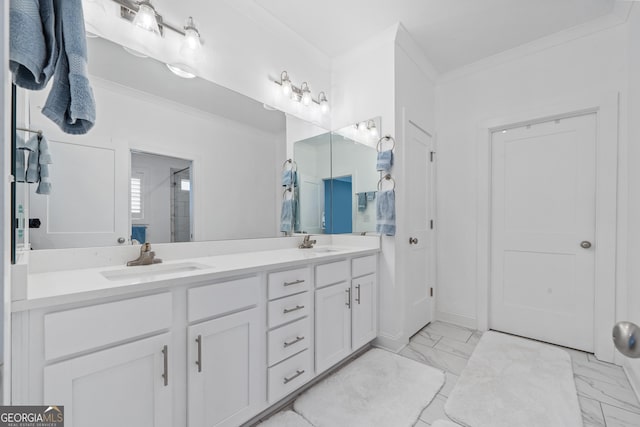 bathroom featuring vanity and ornamental molding