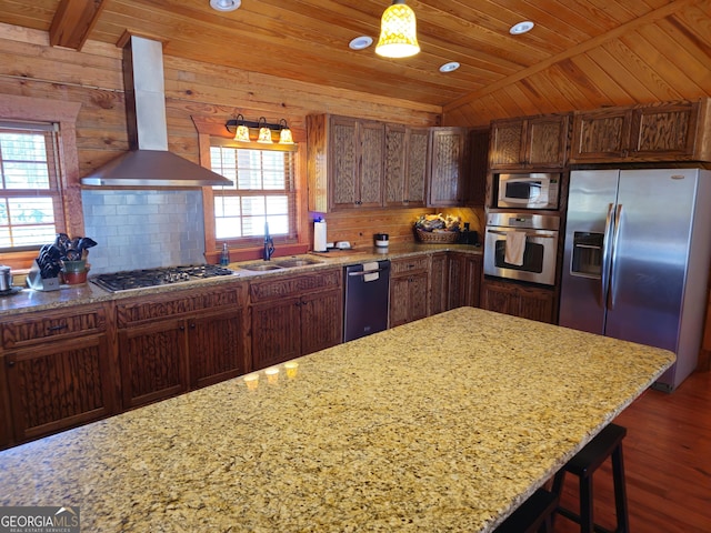 kitchen featuring stainless steel appliances, wood ceiling, light stone countertops, range hood, and sink