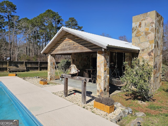 view of patio with an outdoor structure