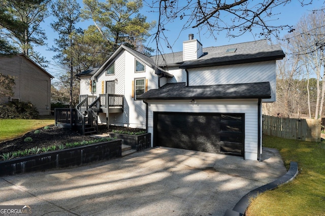 view of front of home with a garage