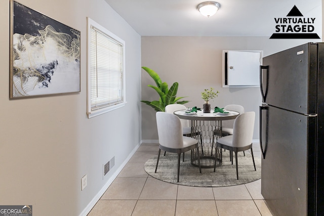 view of tiled dining area