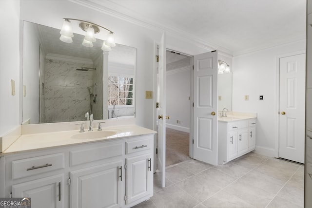 full bath featuring ornamental molding, two vanities, and a sink