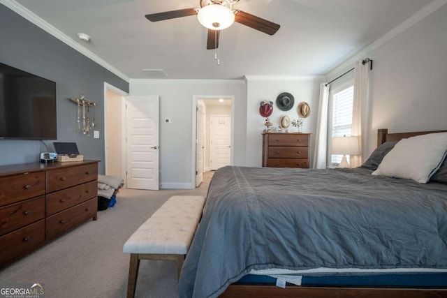 bedroom featuring light carpet, ceiling fan, and crown molding