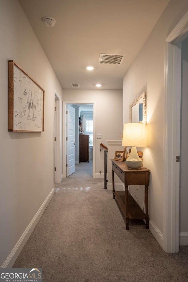 corridor with carpet floors