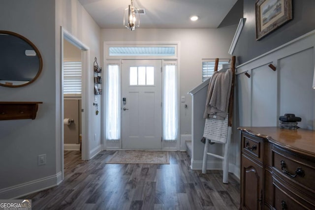 foyer featuring dark wood-type flooring