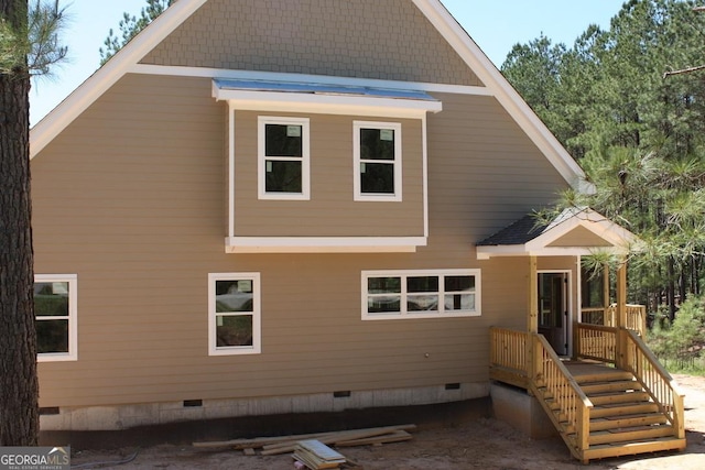 view of home's exterior featuring crawl space