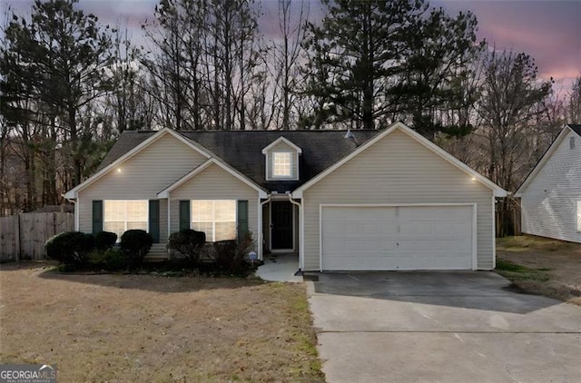 view of front of property with a garage