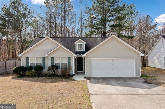 view of front of property with a garage