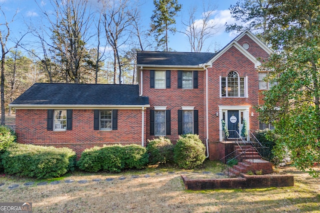 view of front of home with a front yard