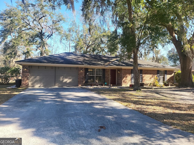 ranch-style home with a garage