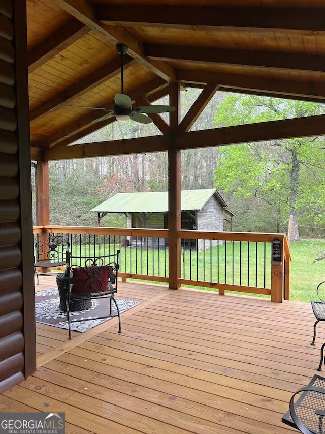 wooden deck with ceiling fan