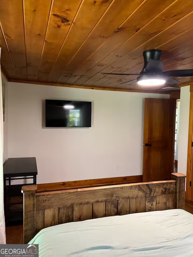 unfurnished bedroom featuring wooden ceiling