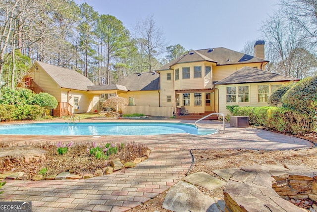 pool featuring a patio area