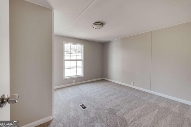 4419 New Kings Bridge Rd, Nicholson, GA 30565 - spare room featuring baseboards and carpet floors