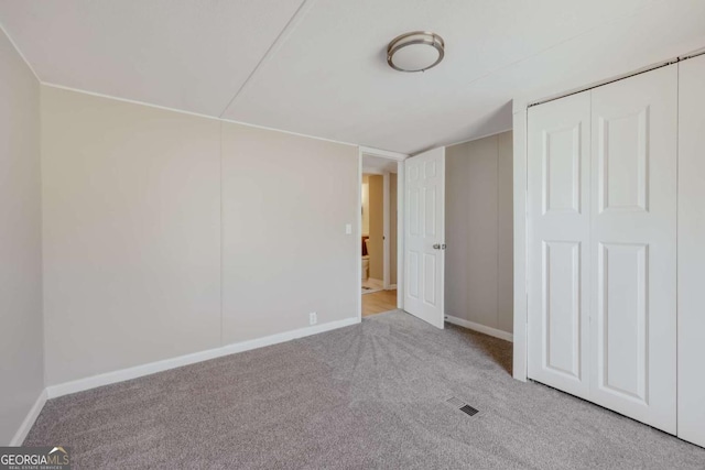 4419 New Kings Bridge Rd, Nicholson, GA 30565 - unfurnished bedroom featuring carpet, baseboards, and a closet